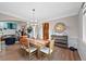 Elegant dining room with hardwood floors and a large mirror at 1 Mountain Birch, Littleton, CO 80127