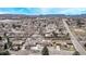 Expansive aerial view showcasing the neighborhood and mountain scenery beyond at 779 Alkire St, Lakewood, CO 80401