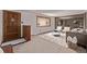 Inviting living room featuring carpet, a window seat, and natural light at 779 Alkire St, Lakewood, CO 80401