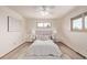 Cozy bedroom with soft carpet, neutral walls and bright natural light at 779 Alkire St, Lakewood, CO 80401