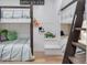 A fun bunk room with plenty of space for to sleep and play at 15116 Lyons Ridge Dr, Morrison, CO 80465