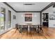 Elegant dining room with hardwood floors and ample natural light, perfect for gatherings at 15116 Lyons Ridge Dr, Morrison, CO 80465