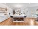 Spacious kitchen with a large center island, modern appliances, and stylish barstool seating at 15116 Lyons Ridge Dr, Morrison, CO 80465