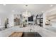 Bright kitchen with a spacious island, modern appliances, and ample counter space at 15116 Lyons Ridge Dr, Morrison, CO 80465