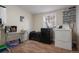 Functional laundry room with modern appliances, ample counter space, and storage options at 3298 S Eudora St, Denver, CO 80222
