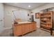 Bright office space with a large desk, natural light, and built-in shelving for organization at 3298 S Eudora St, Denver, CO 80222