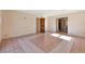 Spacious bedroom with tile floors and an adjacent bathroom at 10550 Highway 73, Conifer, CO 80433