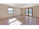 Bright bedroom with tile floors, a window, and access to outdoor views at 10550 Highway 73, Conifer, CO 80433