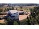 Exterior view of the property, highlighting the architectural design and construction of the home at 10550 Highway 73, Conifer, CO 80433