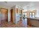 View of kitchen and living space with tile floors and natural light at 10550 Highway 73, Conifer, CO 80433