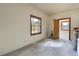 Bright room featuring natural light from two windows and ample space at 10550 Highway 73, Conifer, CO 80433