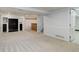 Spacious finished basement with bar area and neutral carpet at 7831 W 109Th Ave, Westminster, CO 80021