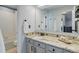 Bathroom with granite countertops, vanity, and tiled flooring at 7831 W 109Th Ave, Westminster, CO 80021