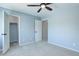 Light and airy bedroom features a ceiling fan, closet, and neutral paint at 7831 W 109Th Ave, Westminster, CO 80021