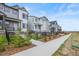Street view of a row of modern homes with sidewalks and manicured front yards at 12580 Boggs St, Parker, CO 80134