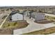 Street view of several modern homes with well-maintained landscaping and spacious driveways at 12580 Boggs St, Parker, CO 80134