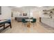 Spacious finished basement with a living area, kitchenette, and stylish furnishings for modern living and entertaining at 7410 Winter Berry Ln, Castle Pines, CO 80108