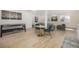 Finished basement offers a stylish living area with a game table and ample seating for relaxation and entertainment at 7410 Winter Berry Ln, Castle Pines, CO 80108