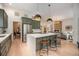 Spacious kitchen with a large island, stylish seating, and an open layout at 7410 Winter Berry Ln, Castle Pines, CO 80108