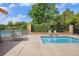 A community pool featuring a splash pool with comfortable lounge seating nearby at 7410 Winter Berry Ln, Castle Pines, CO 80108