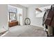 Bedroom with a large window, neutral carpet, and room to customize at 90 S Fraser Cir, Aurora, CO 80012