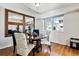 Dining room with hardwood floors, table with seating and natural light at 90 S Fraser Cir, Aurora, CO 80012