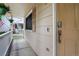 Inviting front porch with hanging flower baskets and a digital lock for added security at 5337 S Ukraine Way, Aurora, CO 80015