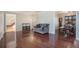 Spacious living room with hardwood floors, neutral colors, and easy access to other living areas at 3257 S Geneva St, Denver, CO 80231