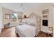 Charming bedroom featuring a unique bunk bed and wood floors at 1721 S Jackson St, Denver, CO 80210