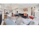 Inviting living room with hardwood floors, plush seating and an open floor plan at 1721 S Jackson St, Denver, CO 80210
