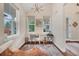 Bright office with vaulted ceiling features plenty of natural light and stylish decor at 1721 S Jackson St, Denver, CO 80210