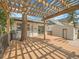 Multi-level wooden deck featuring a built-in tree and grill, perfect for entertaining at 2155 S Emerson St, Denver, CO 80210