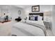 Bedroom featuring white walls, carpet, a queen-size bed, and desk at 2155 S Emerson St, Denver, CO 80210