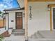 Close up of home's front entrance, showing the house number and craftsman style door at 2155 S Emerson St, Denver, CO 80210