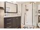 Bathroom featuring a modern vanity with a sink and a glass-enclosed shower at 746 Poppywood Dr, Highlands Ranch, CO 80126