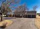 This single story brick home has a 3-car garage, long driveway and is well landscaped at 22 Wedge Way, Littleton, CO 80123