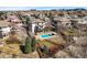 Stunning aerial view of the property showcasing a private backyard with a sparkling swimming pool at 10057 S Shadow Hill Dr, Lone Tree, CO 80124