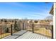 This balcony has a view of the neighborhood and a dark metal safety rail at 10057 S Shadow Hill Dr, Lone Tree, CO 80124