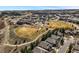 Charming neighborhood aerial view showcasing a park, school, green spaces, and Gathering-friendly environment at 10057 S Shadow Hill Dr, Lone Tree, CO 80124