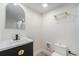 Renovated bathroom showcasing a sleek vanity and a glass-enclosed shower at 719 W 7Th Ave, Denver, CO 80204