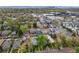 This neighborhood is a mix of homes with mature trees, near business area and downtown in the background at 746 Birch St, Denver, CO 80220