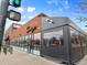 Commercial building with a Snooze restaurant and outdoor patio seating at 746 Birch St, Denver, CO 80220