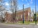Brick church with traditional architecture and well-manicured lawn at 746 Birch St, Denver, CO 80220
