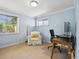 Bright office space with large window, comfortable chair, and functional desk setup at 746 Birch St, Denver, CO 80220