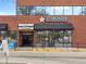Charming retail space, 'Stargazer Fine Chocolates & Coffee', features mall entrance, outdoor seating, and appealing storefront at 746 Birch St, Denver, CO 80220