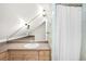 Bathroom boasts a neutral-toned vanity, modern sink and fixtures, with a shower and unique lighting at 4718 W 34Th Ave, Denver, CO 80212