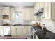 Bright kitchen features modern appliances, countertops, and plenty of storage at 4718 W 34Th Ave, Denver, CO 80212