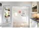 Kitchen space with a view to laundry and rear entry at 4718 W 34Th Ave, Denver, CO 80212