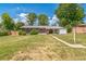Charming brick home with a well-manicured lawn and a cozy backyard, great for outdoor living at 2902 S Meade St, Denver, CO 80236