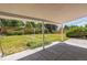 A covered patio area offering a seamless transition to the outdoors, perfect for relaxation and enjoyment at 2902 S Meade St, Denver, CO 80236